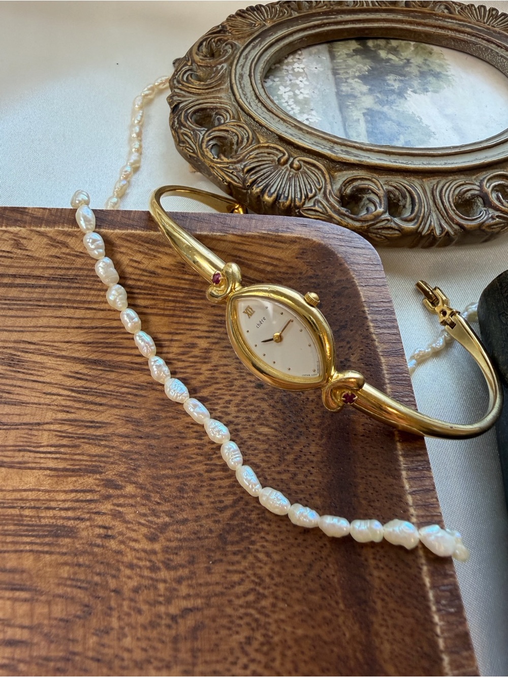 Citizen Gold Teardrop Bangle Watch with 4 Rubies Accents and White Dial